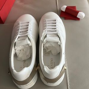 Brand new Valentino Sneakers, never work, still in box.  Prefer local.